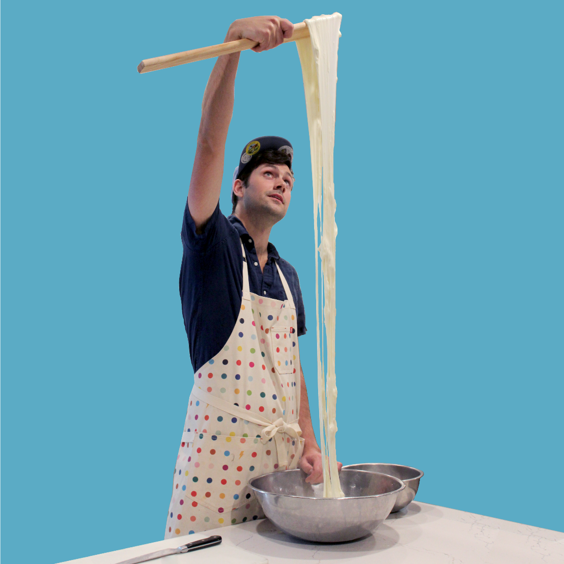 Austin pulling fresh mozzarella